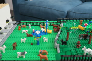Lego sculpture of Lucy's Doggy Daycare and Spa dog park